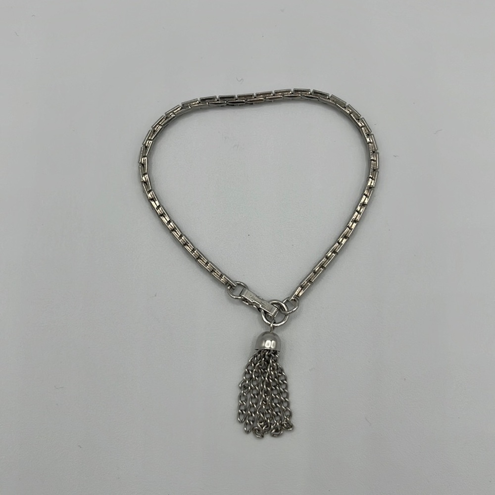 Silver chain bracelet with hanging pendant